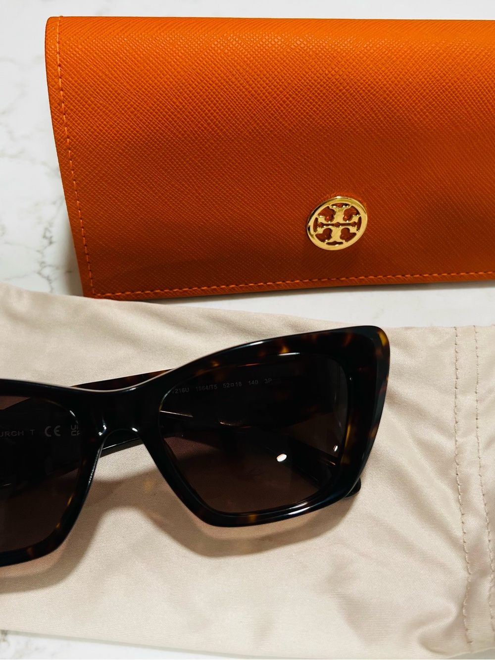 Tory Burch Orange Wallet with Tortoiseshell Sunglasses